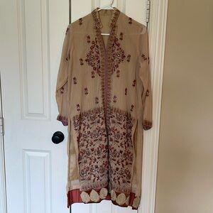 Pakistani Indian embroidered formal kurta.
